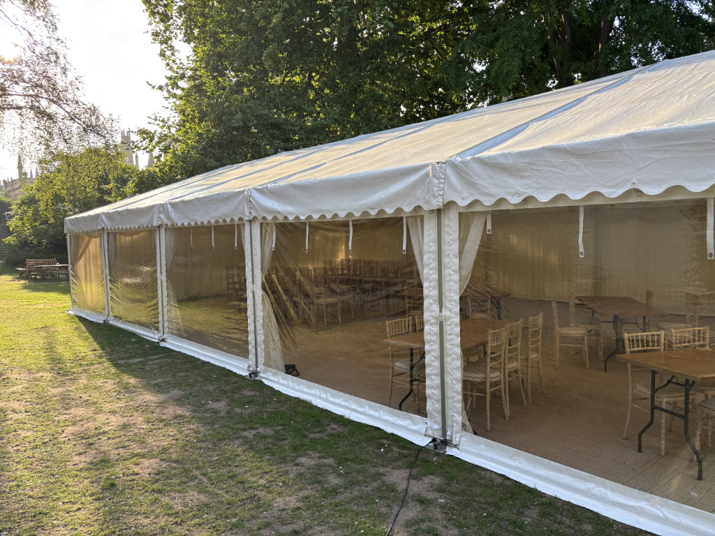 Elegant Scalloped Marquee Roofs with Clear Zip-Up Wall Panels